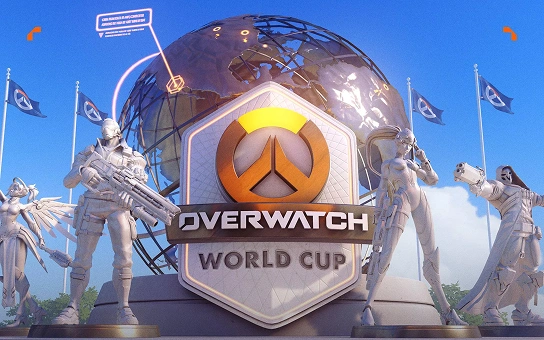 Een futuristisch monument voor de Overwatch World Cup met personages uit de game staat voor een wereldbol. Een tekst kondigt de terugkeer van het evenement in 2026 aan. Aan weerszijden wapperen vlaggen